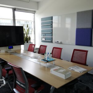 conference room with acoustic panels and whitebord